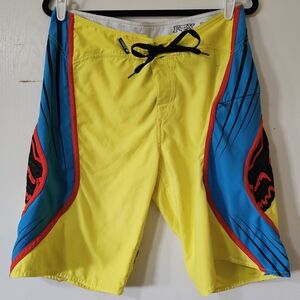 Fox Yellow and Blue Board Shorts with Red Accents